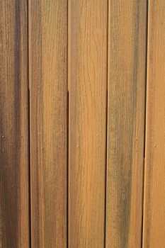 Close up of a wooden wall showing unique pattern.
