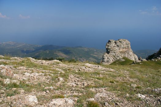 Mountain landscape on a background of the dark blue sky 