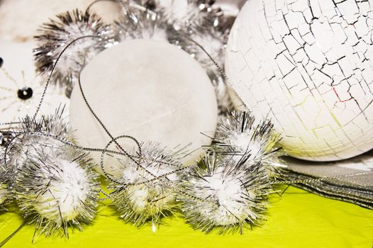 xmas decoration ornaments in white and silver and lime 