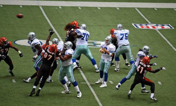 DALLAS - OCT 5: Taken in Texas Stadium in Irving, Texas on Sunday, October 5, 2008. Quarterback Tony Romo is in the pocket thowing a pass down field.

