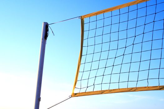 Foto of volleyball net at sunny summer day