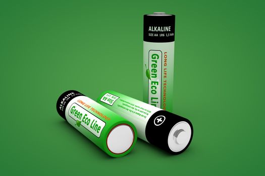 three modern LR 6 1.5 volts batteries on a green background