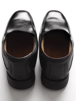 close up of men's black business shoes