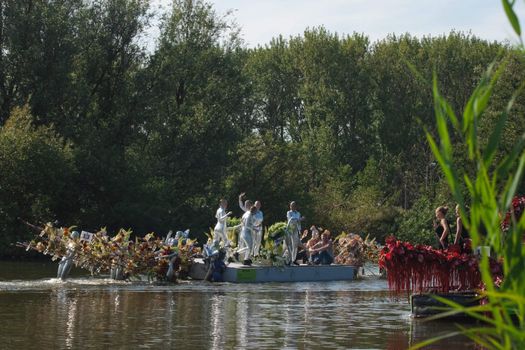 VLAARDINGEN - AUGUST 05: Each year this unique floating parade of beautiful decorated boats sail through the Westland. Theme this year: Theatre on water, August 05, 2011, Vlaardingen, the Netherlands

