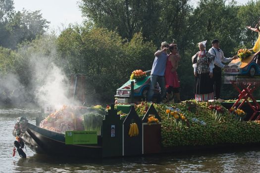 VLAARDINGEN - AUGUST 05: Each year this unique floating parade of beautiful decorated boats sail through the Westland. Theme this year: Theatre on water, August 05, 2011, Vlaardingen, the Netherlands

