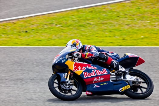 JEREZ DE LA FRONTERA, SPAIN - MAR 5:125cc pilot Jonas Folger races on the official training of the world championship of MotoGP on Mar 5, 2011, in Jerez de la Frontera, Spain