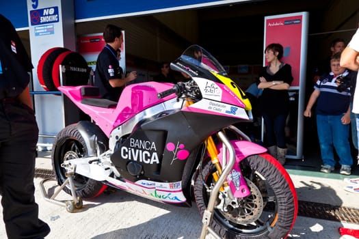 JEREZ DE LA FRONTERA, SPAIN - APR 17: Moto2 Motorcycle of Ivan Moreno waiting in the pitlane in the CEV Championship on April 17, 2011, in Jerez de la Frontera
