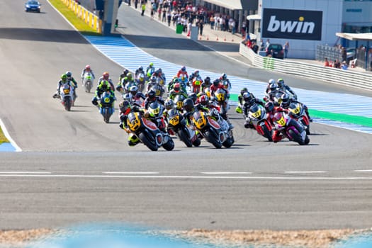 JEREZ DE LA FRONTERA, SPAIN - APR 17: Motorbike competitors begin the Moto2 race in the CEV Championship on April 17, 2011 in Jerez de la Frontera, Spain.