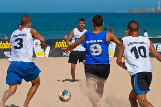 CADIZ, SPAIN -  JUL 22:  Unknown players of unknown team playing the Spanish Championship of Beach Soccer on Jul 22, 2006 on the beach of La Victoria in Cadiz, Spain