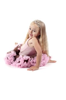 Shot of little girl with long blond hair in studio