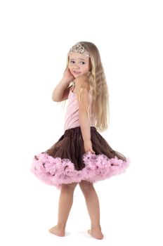 Shot of little girl with long blond hair in studio