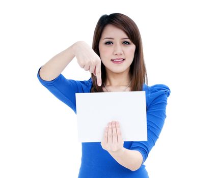 Portrait of a cute woman holding a blank note card, isolated on white background.