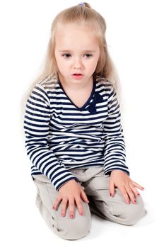 Shot of little cute girl with long hair in studio