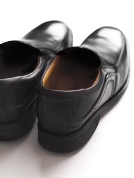 close up of men's black business shoes