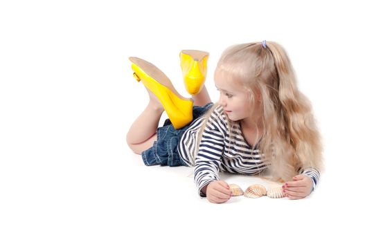 Shot of little cute with mother shoes in studio