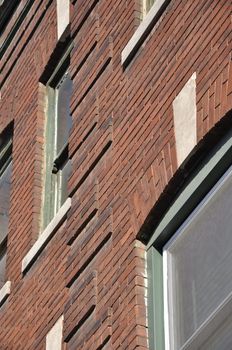 WIndows on re brick building