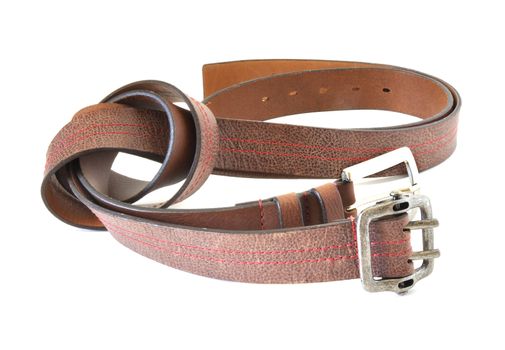 Two brown belts tied over white background