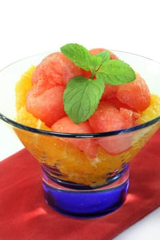 a Melon orange salad with fresh pepper mint