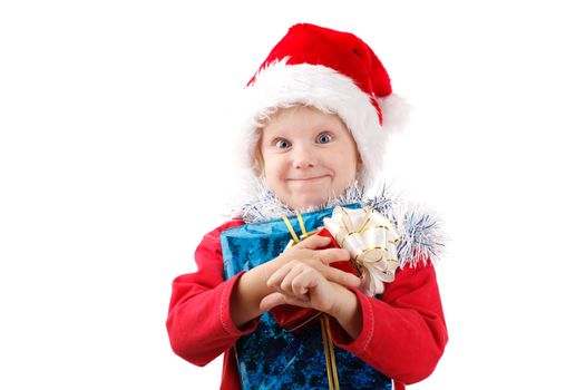 child in Santas cap with present
