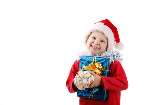 child in Santas cap with present