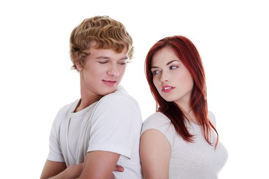 Young caucasian couple looking at each other. Isolated on white background.