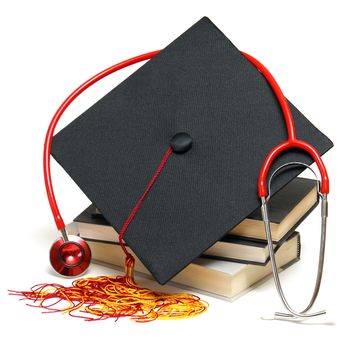 An isolated stethoscope and mortarboard represent a graduating healthcare professional.