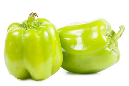 Sweet green peppers isolated over white background