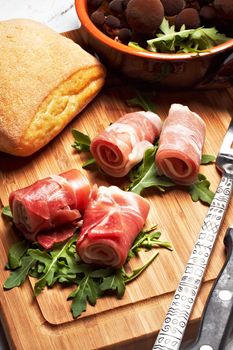 italian raw ham rolled with cheese and mozzarella.