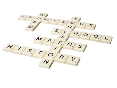 Educational words written with scrabble pieces