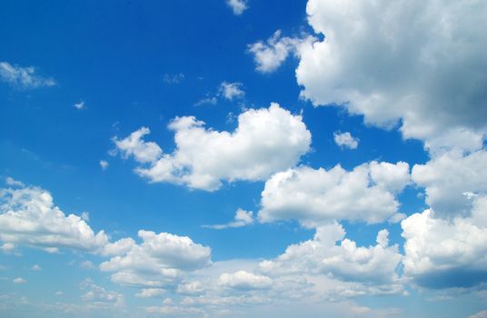 blue sky background with tiny clouds