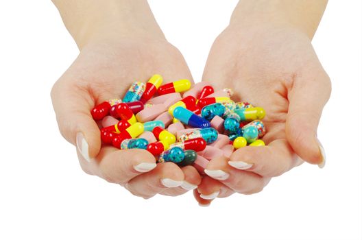 hands holds pill isolated on white
