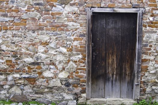 An old rustic doorway in Cesky Krumlov, Europe.