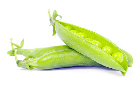 green peas vegetable closeup isolated on white
