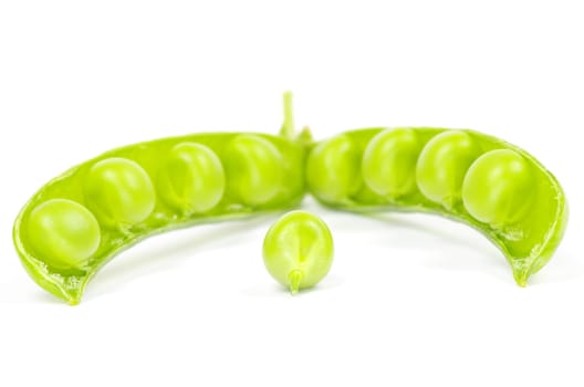 fresh green peas isolated on a white background