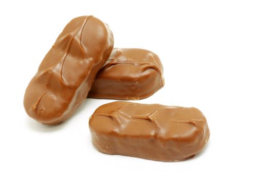 Delicious  chocolate confetti isolated on white
