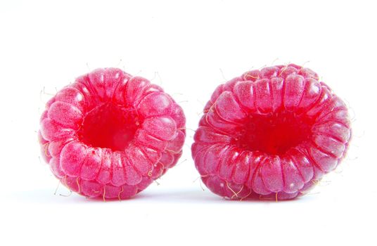 Ripe raspberry on a white background