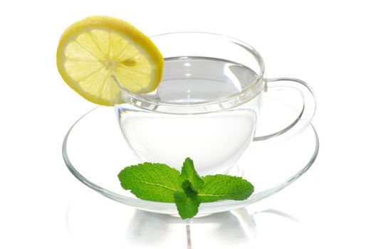 tea in cup with leaf mint and lemon