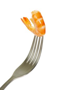 Shrimp on fork over white background