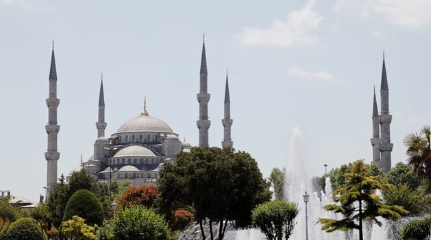 The Blue mosque with its spires, prayer calling towers, gardens and fountains, landscape and  copy space