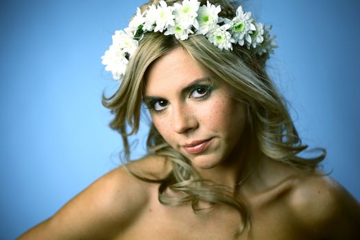 young women on blue flowers in hair