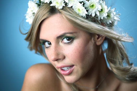 young women on blue flowers in hair