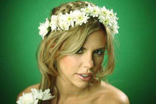 young women on green flowers in hair