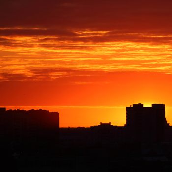 city sunrise close up yellow sky