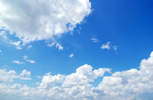 blue sky background with tiny clouds
