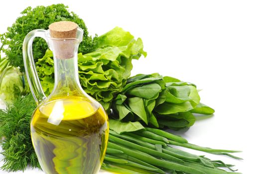 herbs and oil over white