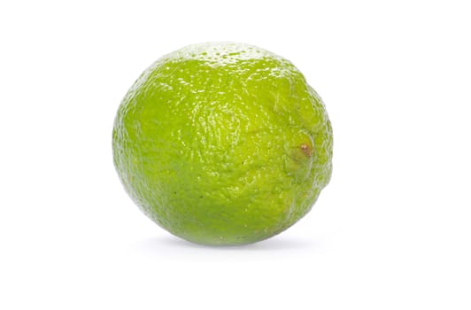 Fresh ripe lime isolated on white background