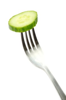 fresh cucumber on a fork