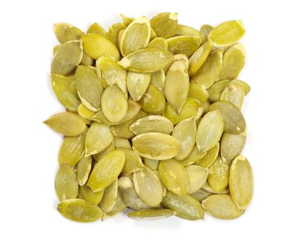 fresh pumpkin seeds isolated on a white