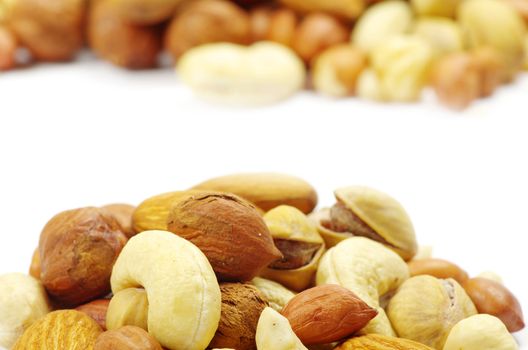 Assorted mixed nuts on white background