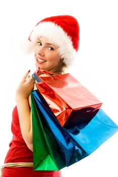 cheerful girl wearing Santa's hat with Chrismas presents
